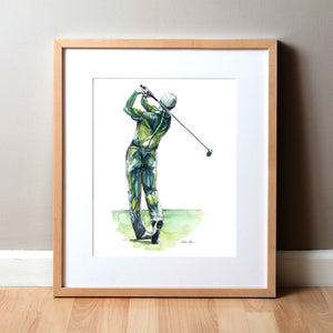 Framed watercolor painting of a golfer’s anatomy during a golf swing.