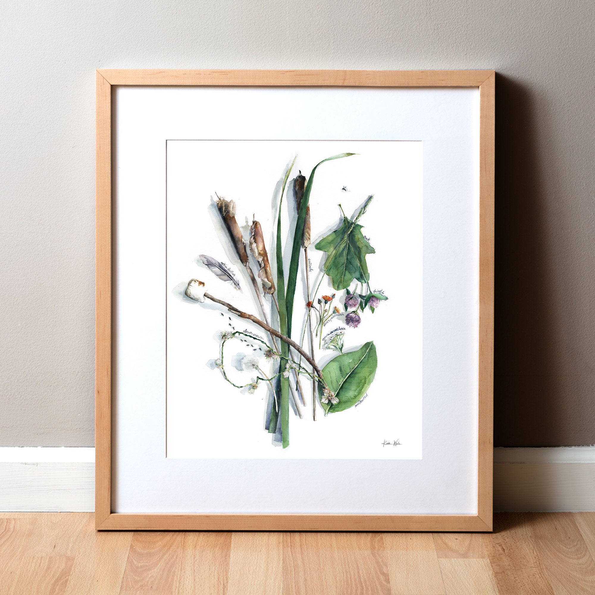Framed watercolor painting of a collection of summer foraged items.