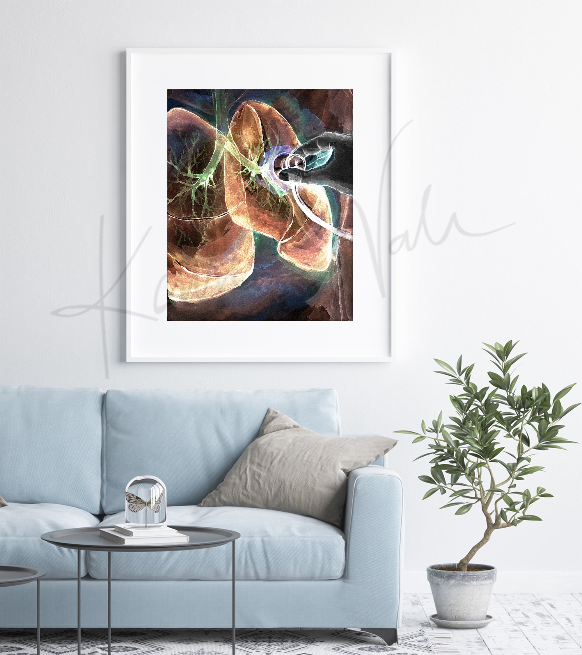 Framed watercolor painting of lung auscultation in orange, black, green, and purple. The painting hangs over a blue couch.