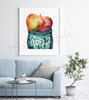 Framed watercolor painting of the gastrointestinal system. The painting is hanging over a blue couch.