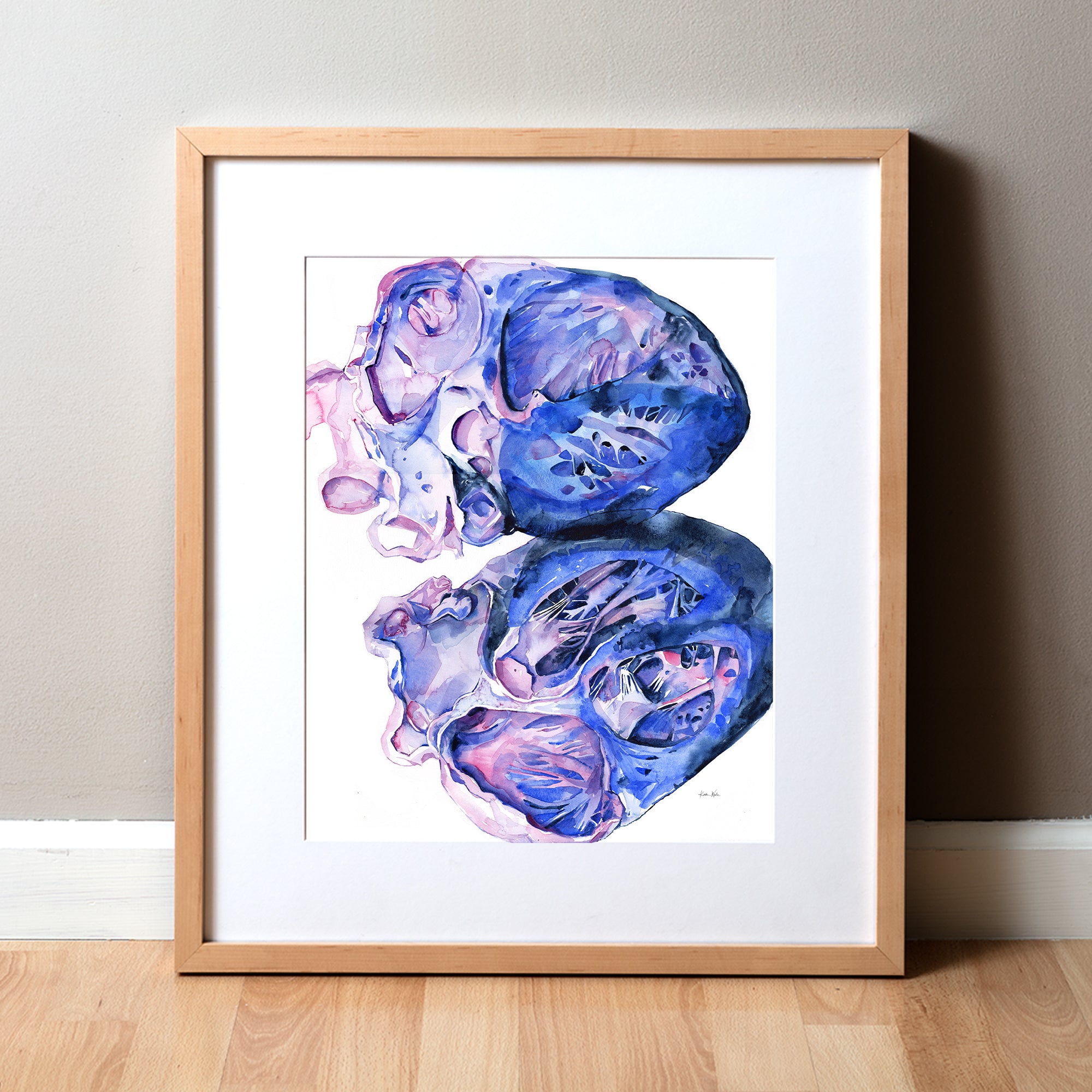 Framed watercolor painting of a heart dissection in pinks, purples, and vibrant blues.