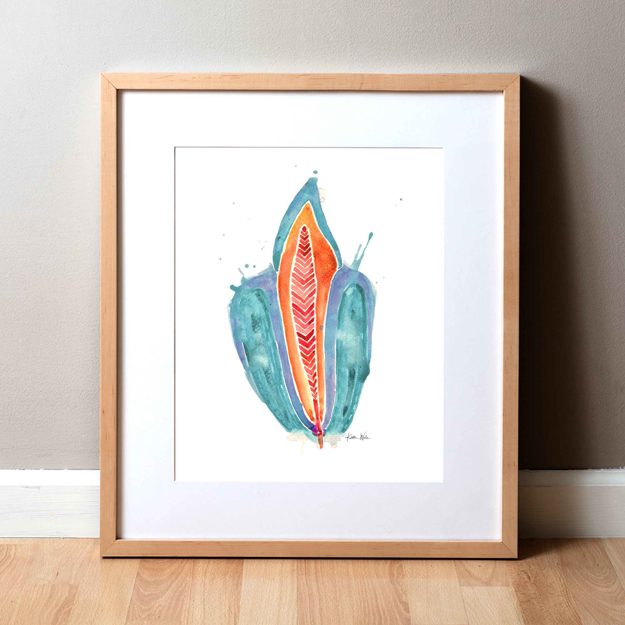 Framed watercolor painting of an abstract incisor in teal, orange, and red.