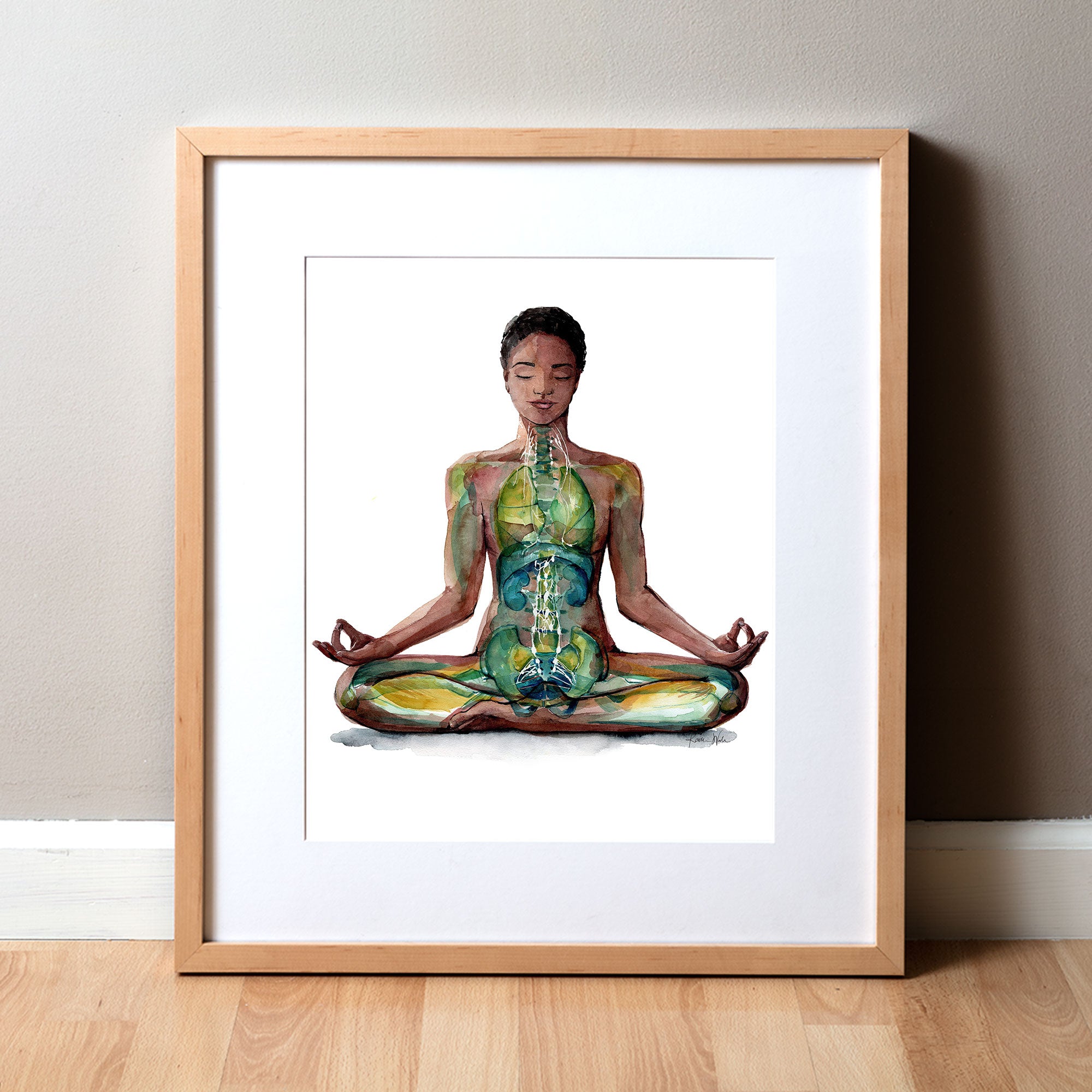 Framed watercolor painting of a woman of color in a peaceful yoga pose.