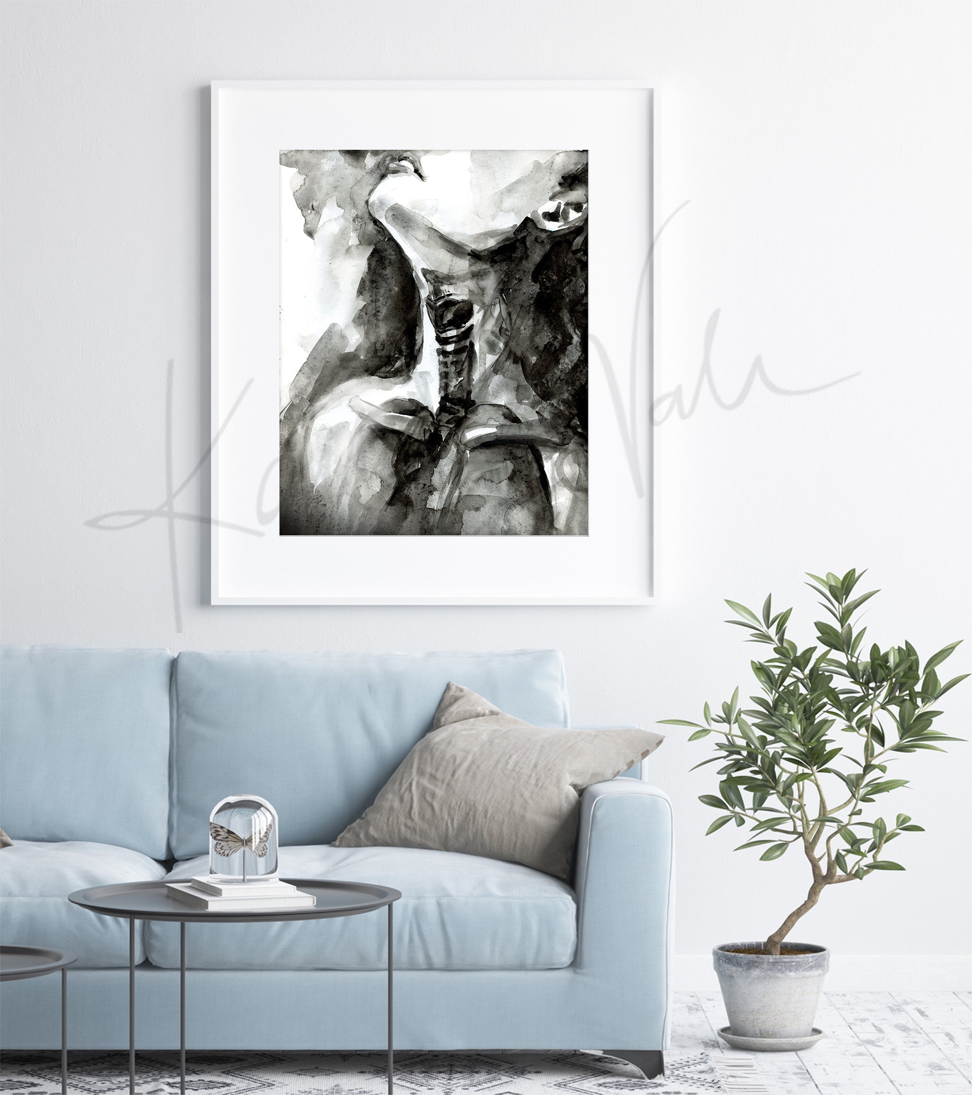 Framed watercolor painting of a woman with her face up taking a deep breath. Showing some of the throat and chest anatomy. The painting is hanging over a blue couch.